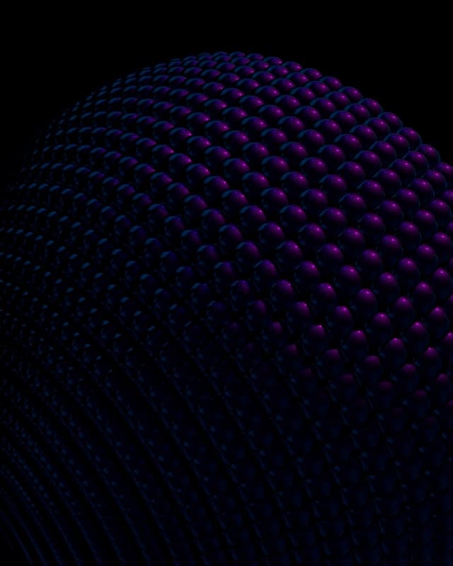 Abstract dark sphere with a purple and blue textured spherical pattern.
